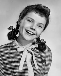 Portrait of a teenage girl smiling poster print showcasing vibrant colors and joy.