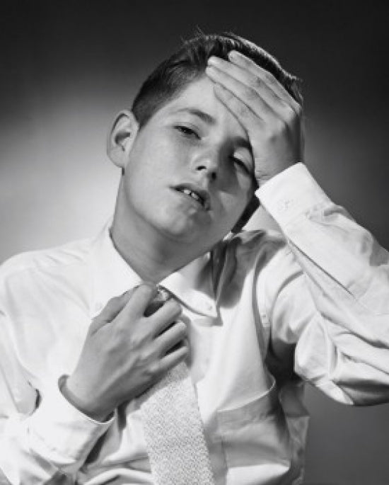 Close-Up of a Boy Feeling Unwell Poster Print on high-quality paper.