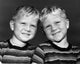 Portrait of Twin Boys Smiling Poster Print showcasing joyful expressions.