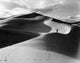 Person walking on sand dunes in California desert poster print