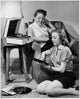 Two teenage girls enjoying music poster print for home decor.