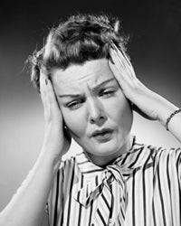 Close-up poster print of a woman suffering from a headache