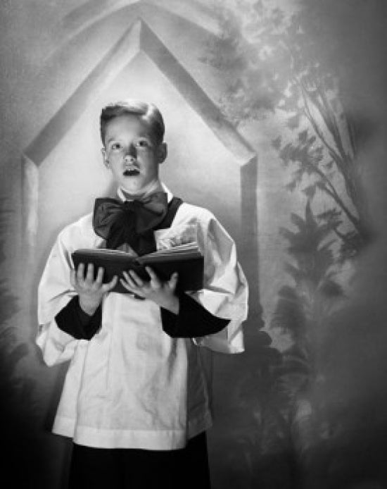 Choir boy holding a book and singing poster print