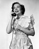 Young Woman Talking on the Telephone Poster Print