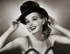 Close-up poster print of a smiling dancer capturing joy and movement.