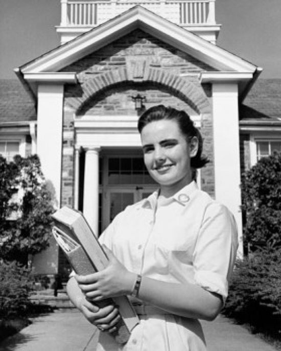 Teenage girl holding books and smiling poster print
