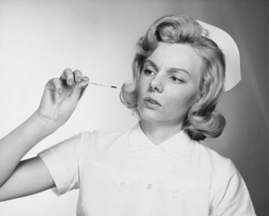 Female Nurse Reading a Thermometer Poster Print
