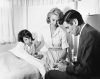 Male doctor writing a prescription for a female patient poster print.