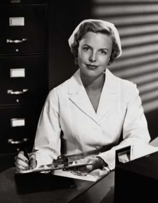 Portrait of a female nurse writing on a clipboard poster print.