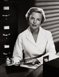 Portrait of a female nurse writing on a clipboard poster print.