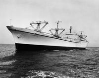 Military Ship at Sea Poster Print showcasing a naval vessel in the ocean.