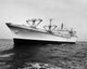 Military Ship at Sea Poster Print showcasing a naval vessel in the ocean.