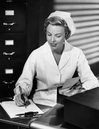 Female nurse writing on a clipboard poster print