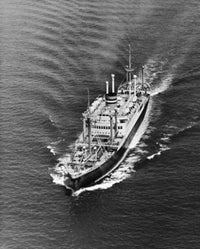 High angle view of a cruise ship sailing in the blue sea