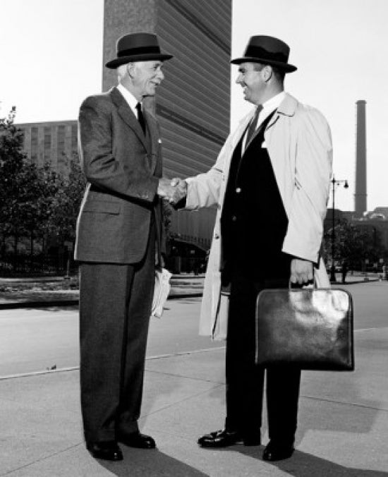 Businessmen shaking hands in downtown, professional art print.