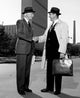 Businessmen shaking hands in downtown, professional art print.