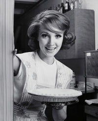 Portrait of a young woman holding an apple pie poster print.