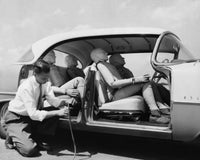 Mid Adult Man Preparing for Auto Safety Test Poster Print showcasing determination.