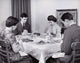 Two Young Couples Praying Before a Meal Poster Print
