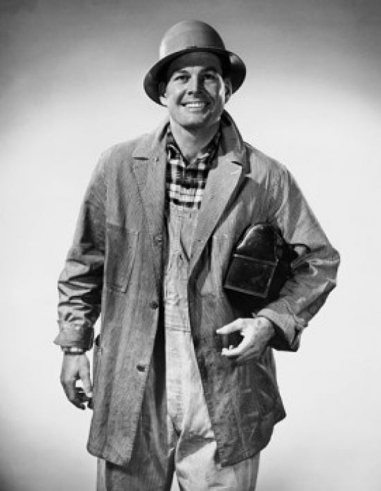 Portrait of a smiling construction worker poster print.