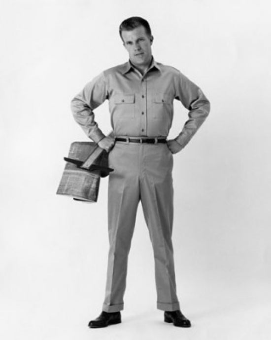 Male architect standing with arms akimbo poster print.