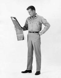 Male Architect Reading a Blueprint Poster Print