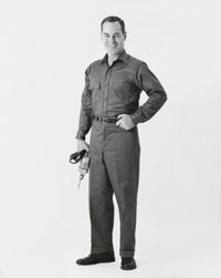 Cheerful carpenter holding a drill poster print