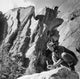 Geologist Breaking a Stone Poster Print showcasing a geologist with a hammer.