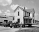 House on a Flatbed Truck Poster Print showcasing a unique design.