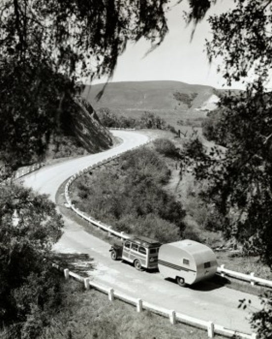 High angle view of a camper attached to a truck on the road in Solvang, California.