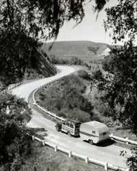 High angle view of a camper attached to a truck on the road in Solvang, California.