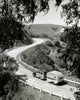 High angle view of a camper attached to a truck on the road in Solvang, California.