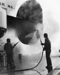 Manual Workers Cleaning Airplane with Steam Poster Print