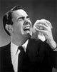 Close-up of mature man sneezing poster print showcasing humor and emotion.