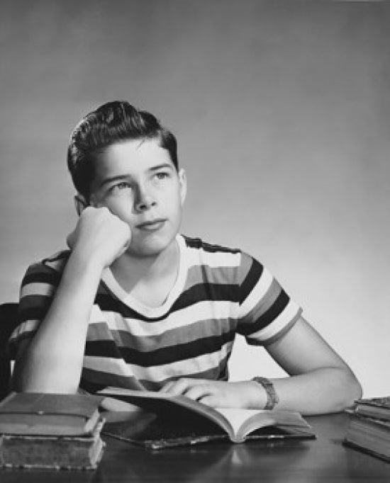 Portrait of Boy Thinking Poster Print showcasing a young boy in deep thought.