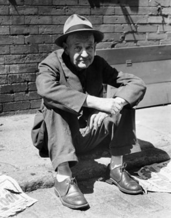 Portrait of a Mature Man Sitting on the Street Poster Print