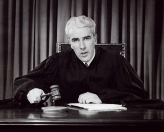 Portrait of a Judge Holding a Gavel Poster Print