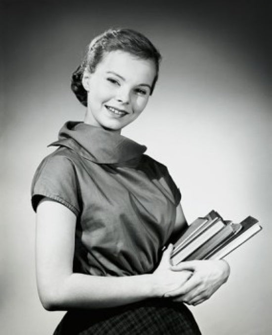 Teenage girl carrying books poster print in vibrant colors.