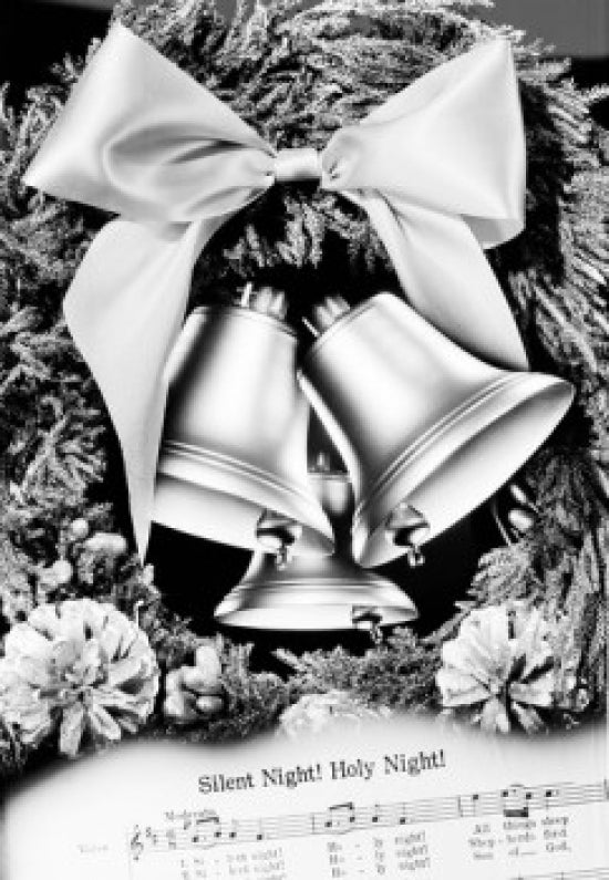 Close-up of Christmas bells with sheet music, festive decoration.