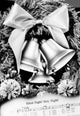 Close-up of Christmas bells with sheet music, festive decoration.