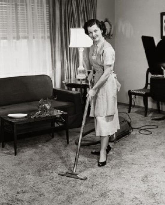 Portrait of a Young Woman Vacuuming Carpet Poster Print