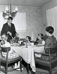 Thanksgiving Family Gathering Poster Print featuring a mature couple with their children at a dining table.