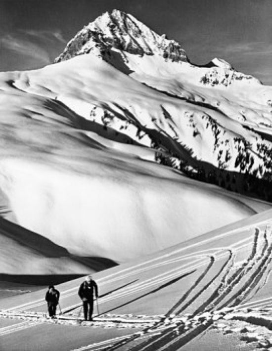 Poster print of two people skiing on a snow-covered landscape in British Columbia, Canada