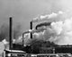 Smoke emerging from smoke stacks at Union Bag & Paper Company in Savannah, Georgia Poster Print