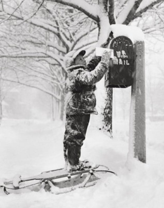 Boy putting a letter into a mailbox poster print.