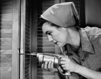 Close-up of a young woman drilling a shutter, poster print.