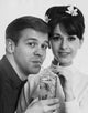 Portrait of a teenage couple sharing juice from a glass poster print.