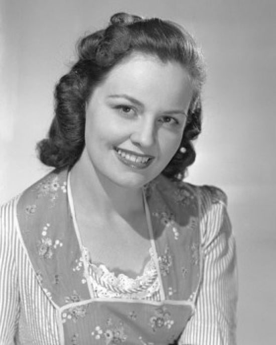 Portrait of Young Woman Smiling - Studio Shot Poster Print