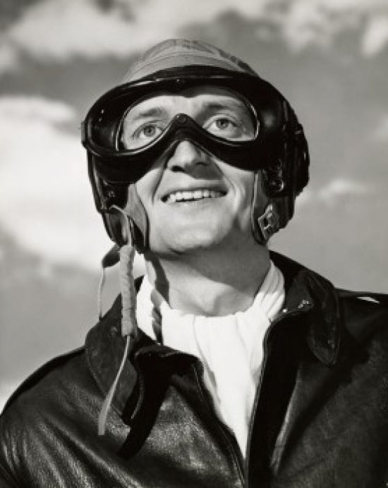 Close-up of a smiling pilot poster print, showcasing vibrant colors and joyful expression.