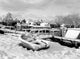 Snow Covered Boats in Harbor Poster Print capturing winter tranquility.